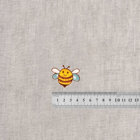Ecusson dans le jardin - Abeille